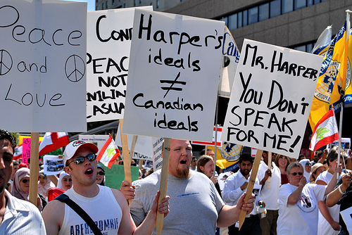 A 2006 Calgary rally against Harper's foreign policy. (Photo: ItzaFineDay / flickr)