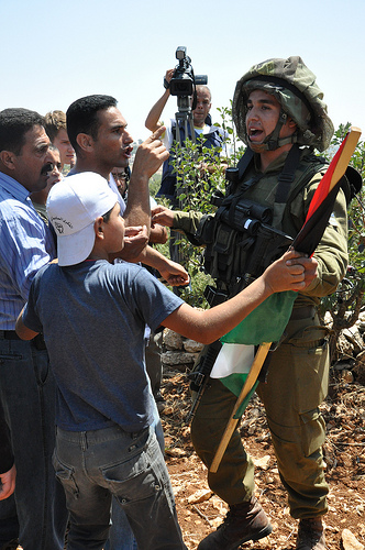 A 2010 protest in the West Bank village of Beit Ommar. (Photo: karathepirate / flickr)