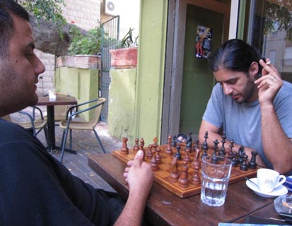 Playing chess at a 'leftie' bar in Haifa, Israel. Photo: Rachel Marcuse