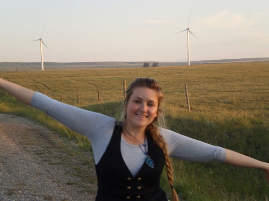 Day3-Emily with windturbines