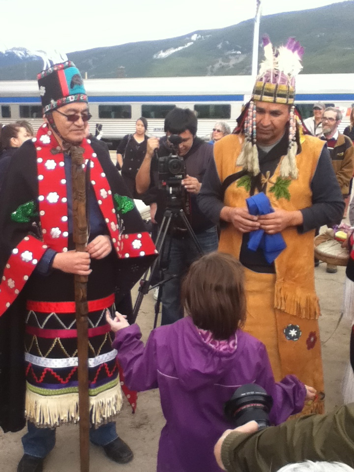 Hereditary Chief Na’Moks (Left) and Hereditary Chief Tsodih (Right) of the Yinka Dene Alliance are greeted at the Jasper, Alberta stop of the Freedom Train Tour. (Photo: www.freedomtrain2012.com)