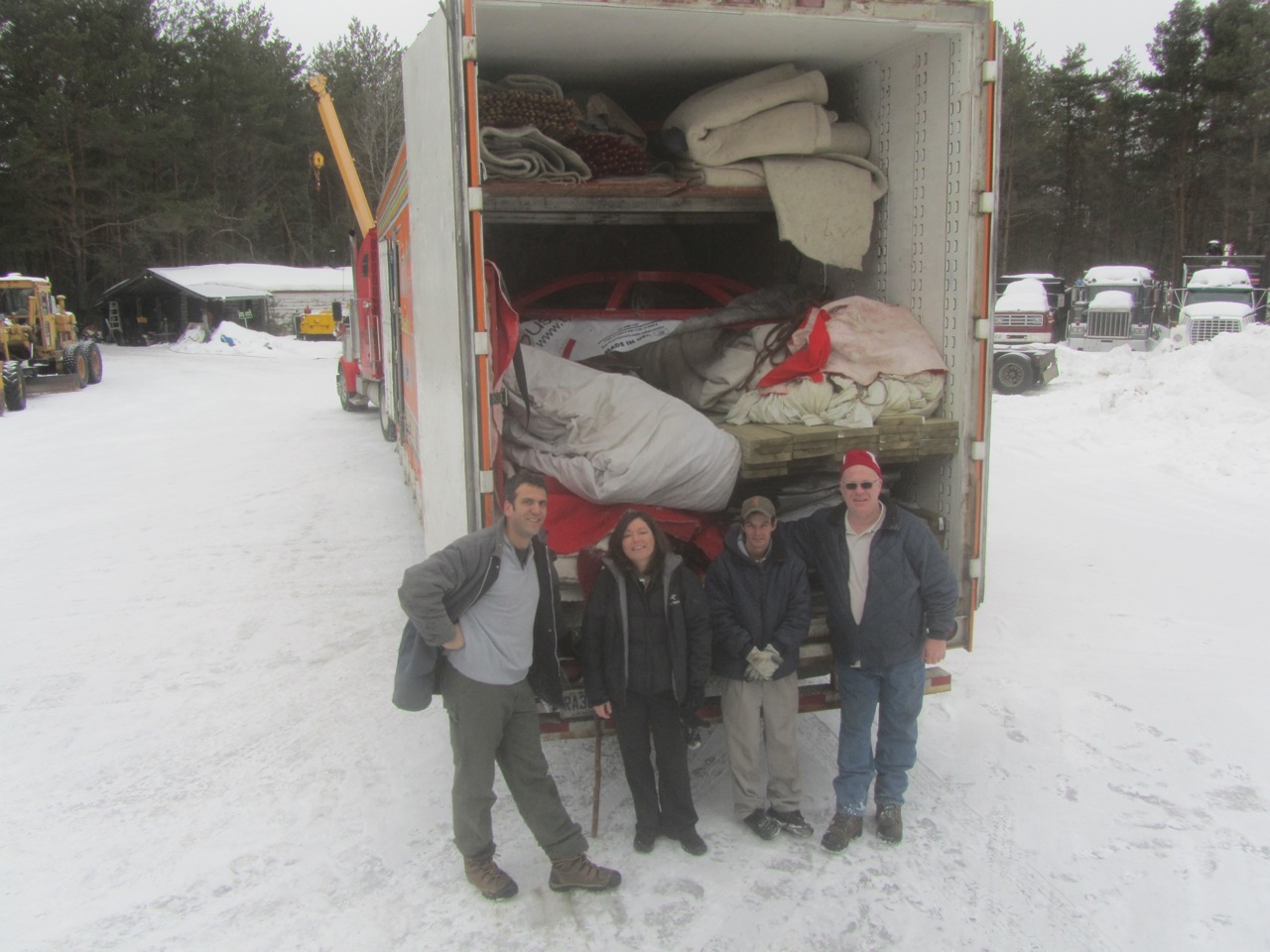 Yves Ballenegger, Laurie Miller, Cory Robertson, and Steve Rider in Emsdale. Yurt is loaded.