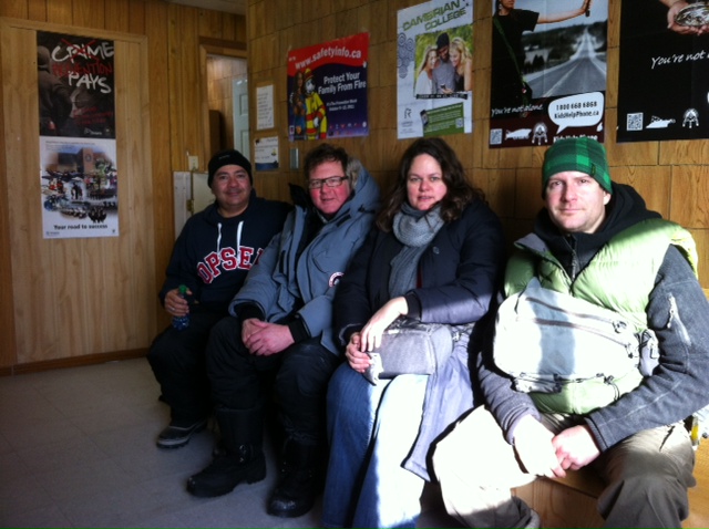 Gord Longhi, Tim Gilbert, Katie Weber, and Andy Thomson waiting to meet with the Chief and Council.