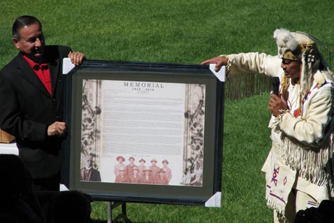 Grand Chief Stewart Phillip, Syilx, (left) and Chief Wayne Christian, Secwepemc, (right) with framed Memorial. Photo: Kerry Coast