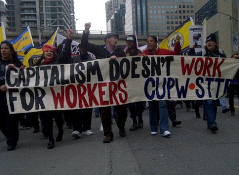 Nine hundred union and community protesters occupied the intersection of King and Bay streets in the heart of Toronto's financial district on Thursday in support of the Occupy movement. Photo: Jesse McLaren