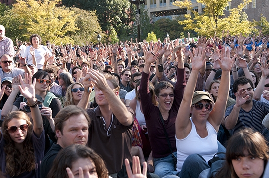 At general assemblies, like this one in Washington Square Park on  Oct. 8, protesters use hand gestures to express agreement with  proposed ideas. Photo: Darren Ell