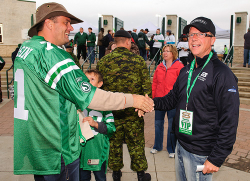 Saskatchewan premier Brad Wall greets fans at a University of Saskatchewan Huskies football game in August. Photo: Steve Hiscock for Liam Richards Photography