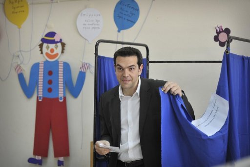 Alexis Tsipras, leader of the left coalition party Syriza, leaves his voting booth earlier today. (Photo: Alternet.org)