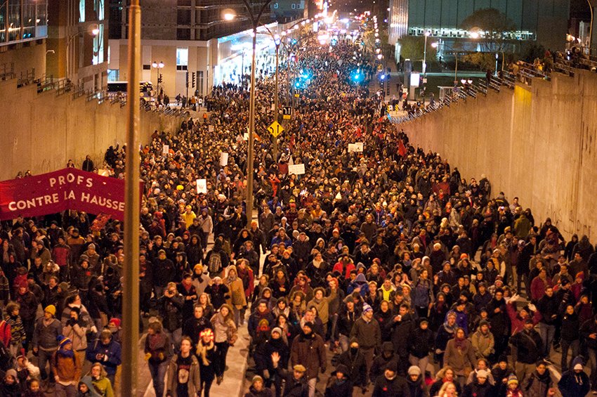 Quebec students fill the streets of Montreal at night. (Photo: Darren Ell)