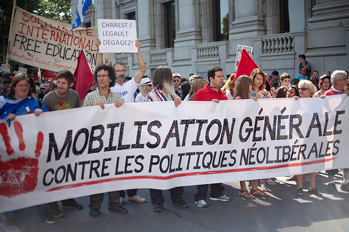 One of the lead banners on the August 22 march. (Photo: Thien V / flickr)