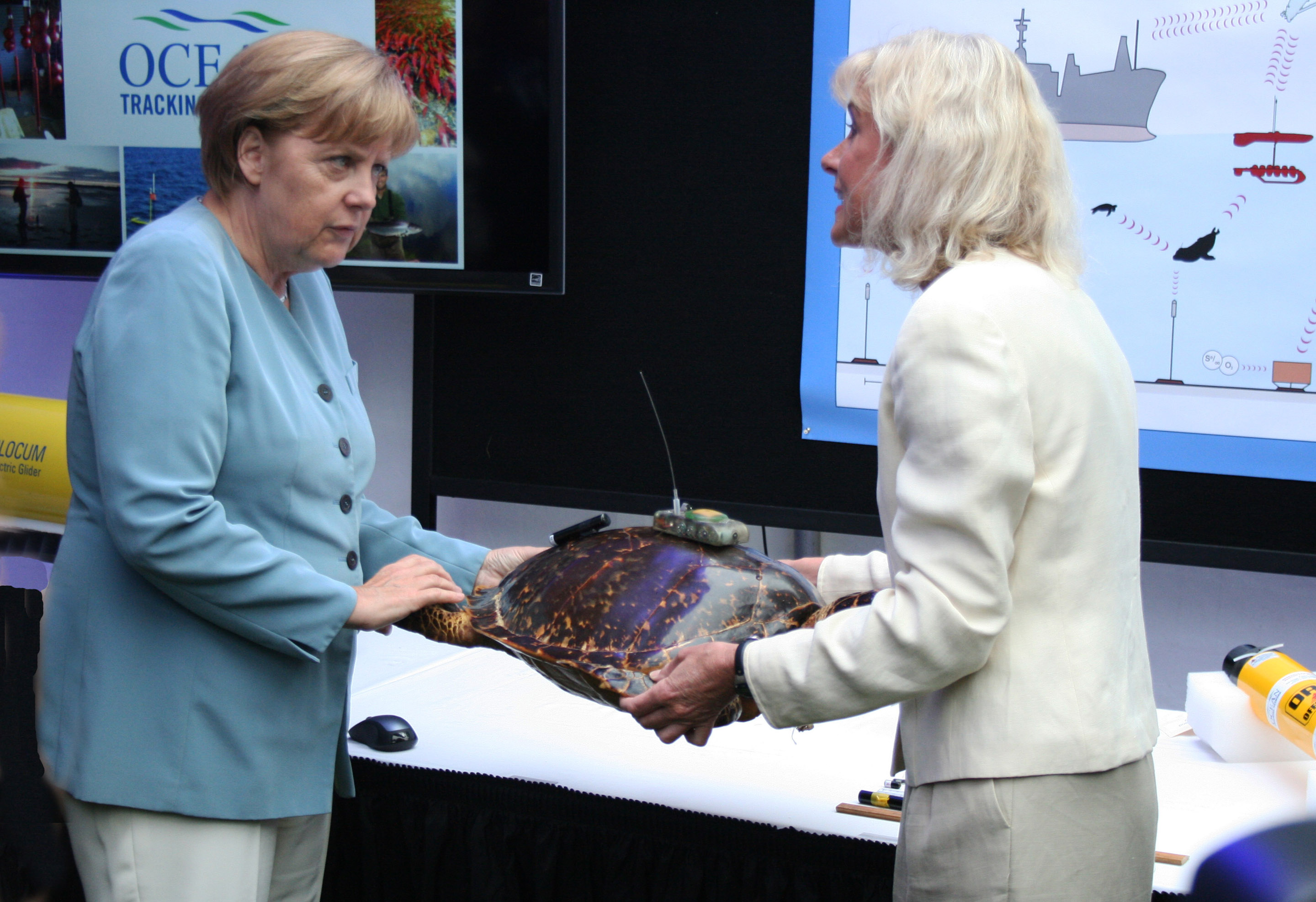 Angela Merkel and Sara Iverson at Dalhousie University.