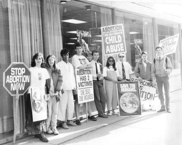 The writer, far left next to the 'Stop Abortion' sign.