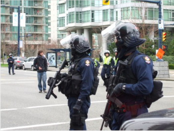 Riot police in Vancouver at 2010 Olympics. There will be no ban on these masks.