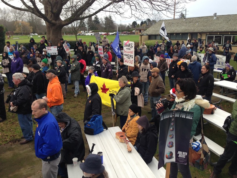 The Council banner visible at the protest.