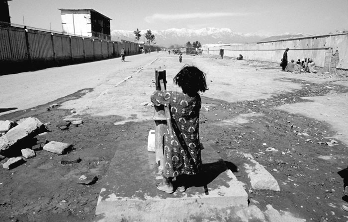 Girl at Water Pump by Lorenzo Franzi