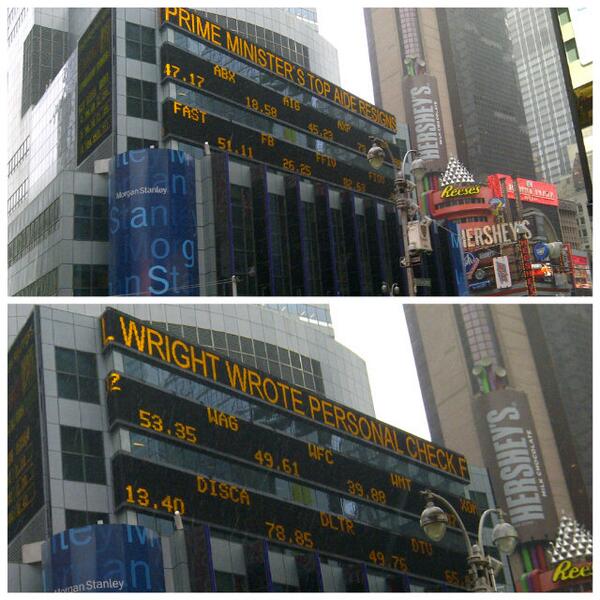 Times Square ticker in NYC reports on Nigel Wright's resignation.