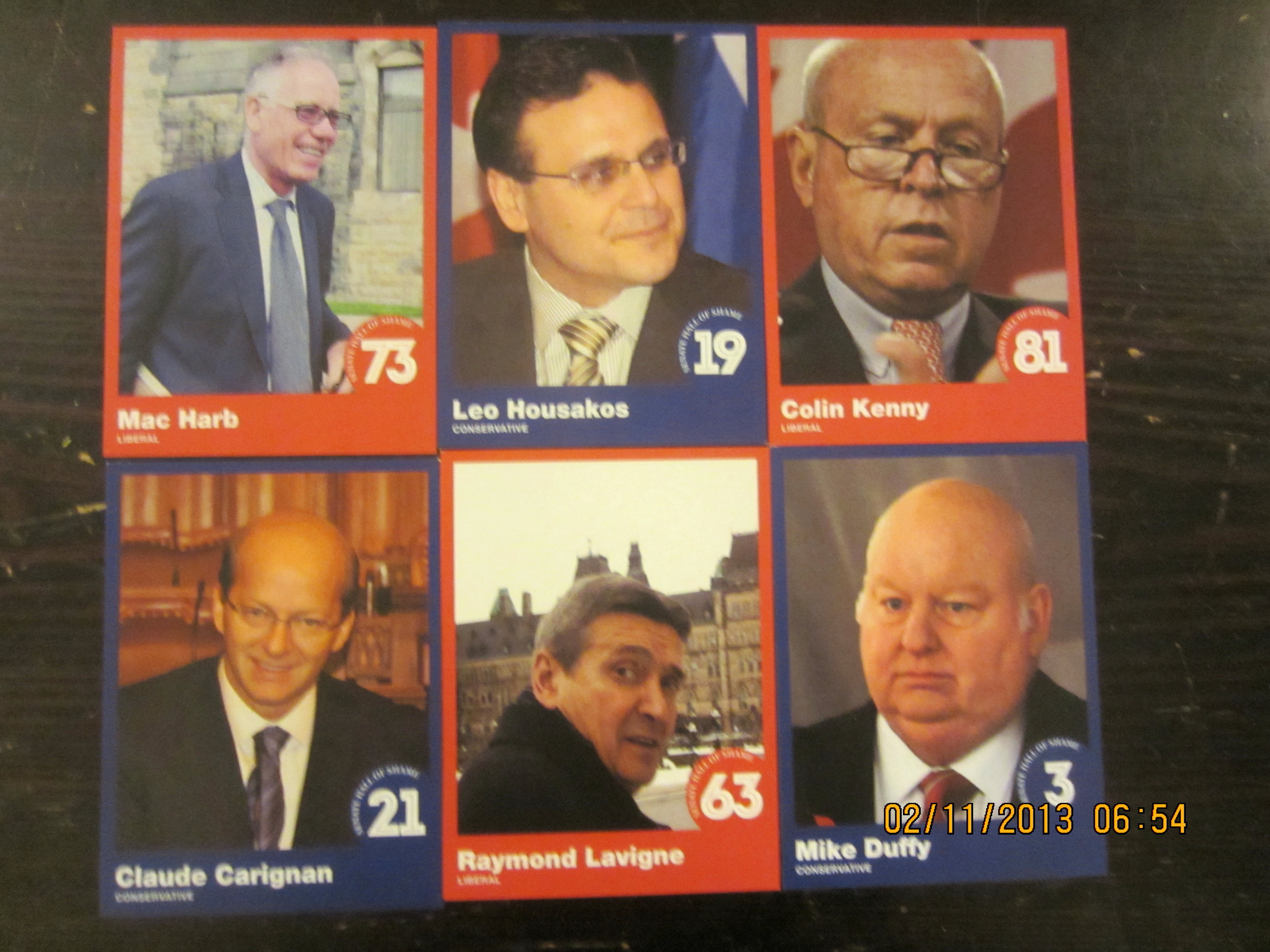 Six cardboard cards with photos of Canadian Senators