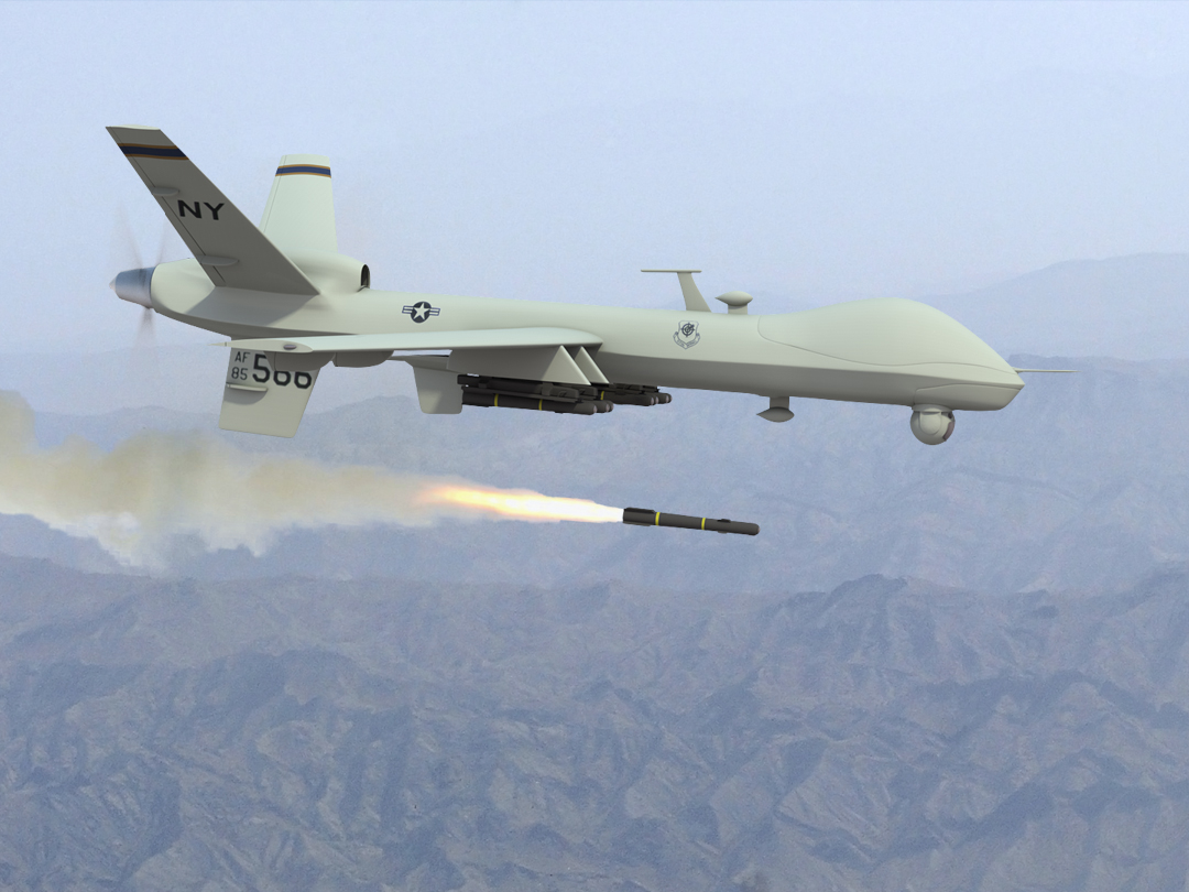 MQ-1 Predator Drone launching a Hellfire missile.