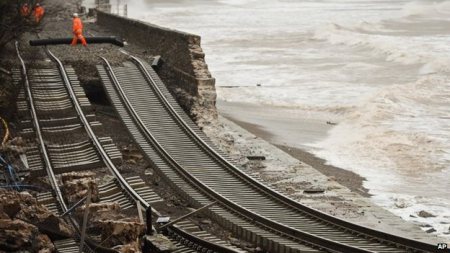 flooding_in_britain_rail_line_washed_out_at_dawlish