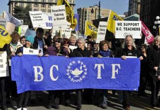 teachers_rally_at_right_holding_banner_is_bctf_president_jim_iker_photo_bctf