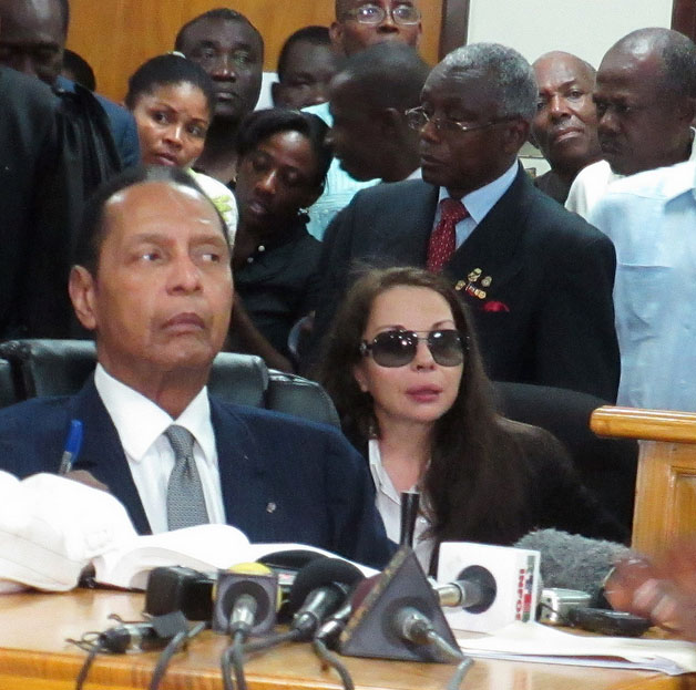 jean-claude_duvalier_and_his_partner_veronique_roy_in_a_haitian_courtroom_feb_18_2012_photo_milo_milfort-ips_flikr_commons