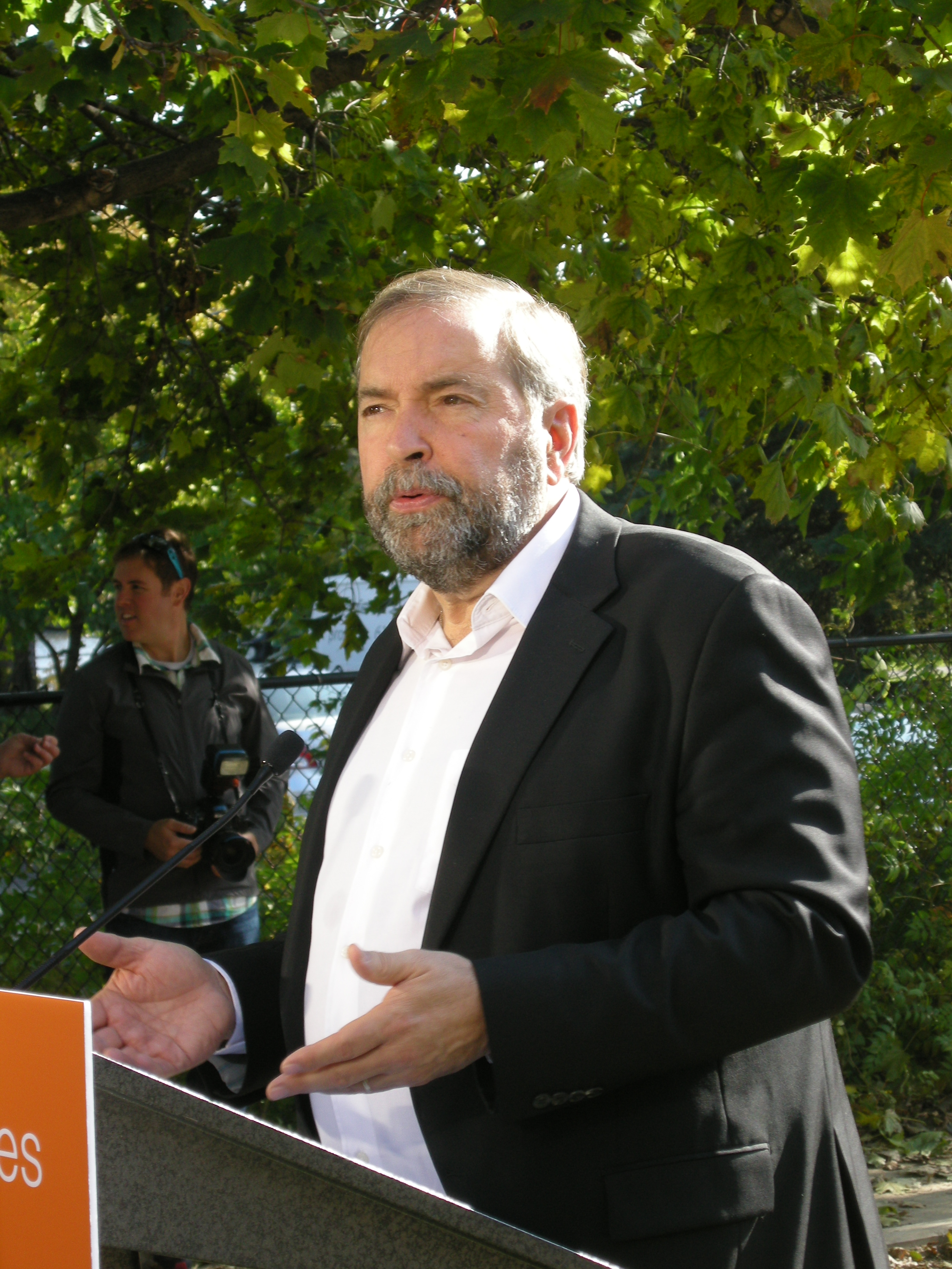 Harper's reduced surplus poses a challenge for Mulcair (pictured) and Trudeau