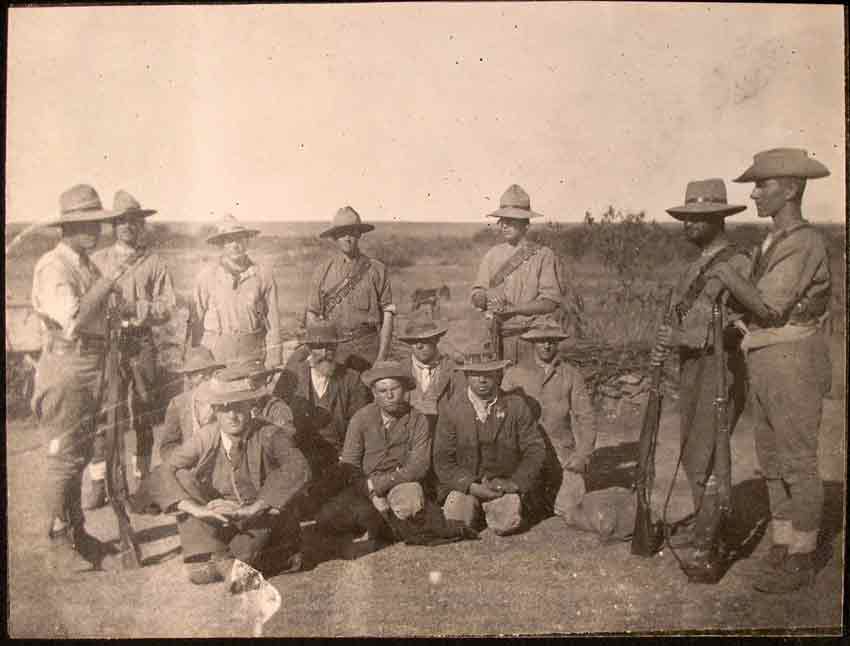 Canadian soldiers in the Boer War with unnamed Boer prisoners of all ages.