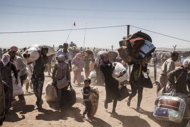 Syrian refugees entering Turkey, UNHCR/I.Prickett