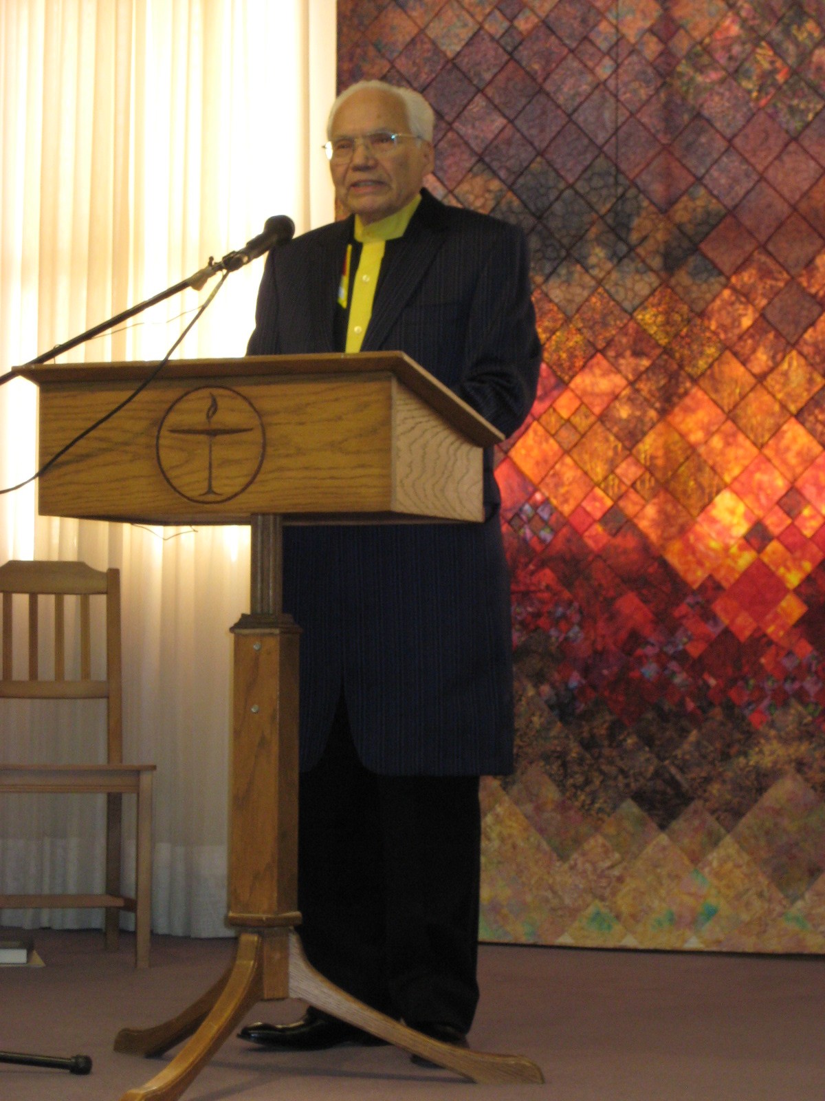 William Wutunee at lectern