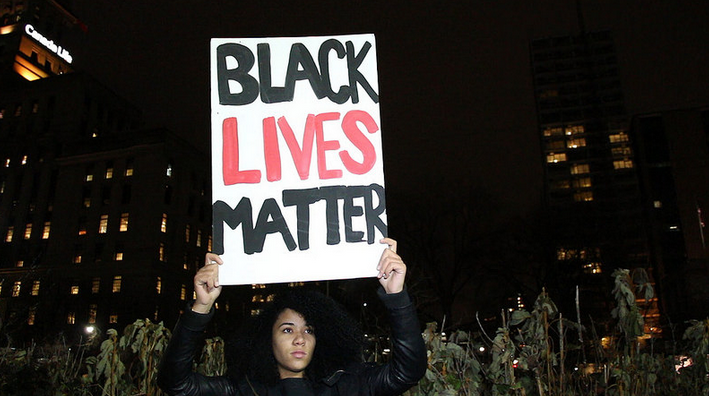Photo by Rebel Sage; Black Lives Matter Toronto protester at Nov 2014 demonstrat