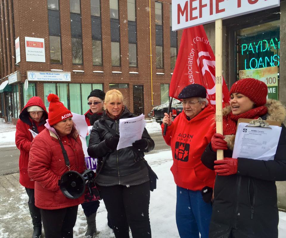 Amber Slegtenhorst stands out in black while rallying for workers' rights. Suppl