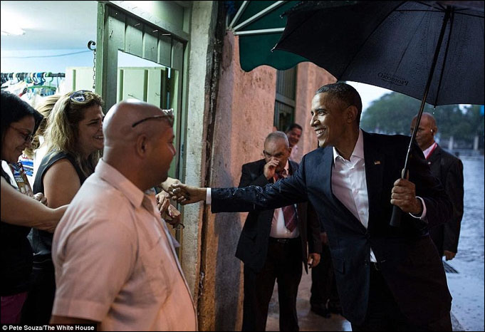 President Barak Obama walks the streets of Havana upon arrival in Cuba March 20,