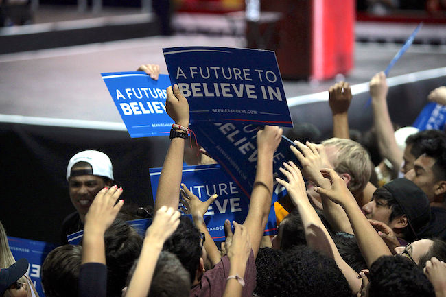 Bernie Sanders rally signs reading "A Future to Believe In"