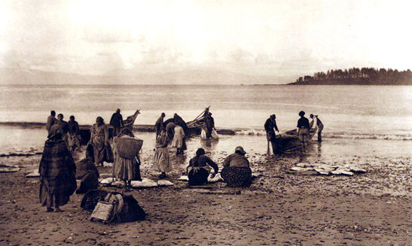 Nuu-chah-nulth people with dugout canoes on the West Coast of Vancouver Island.