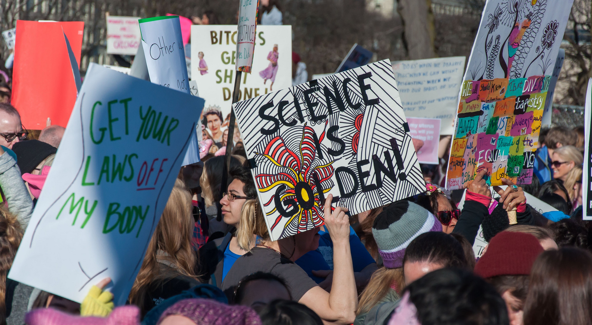 "Science is golden" protest sign.