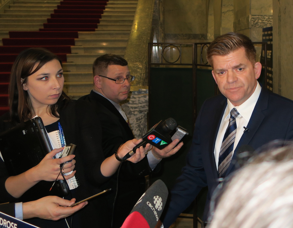 Wildorse Leader Brian Jean with reporters. But where's Jason?