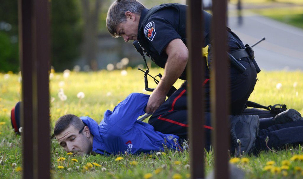 News videographer Jeremy Cohn, tackled and arrested by Hamilton Police on May 16, 2017. Image: Barry Gray. Used with permission.