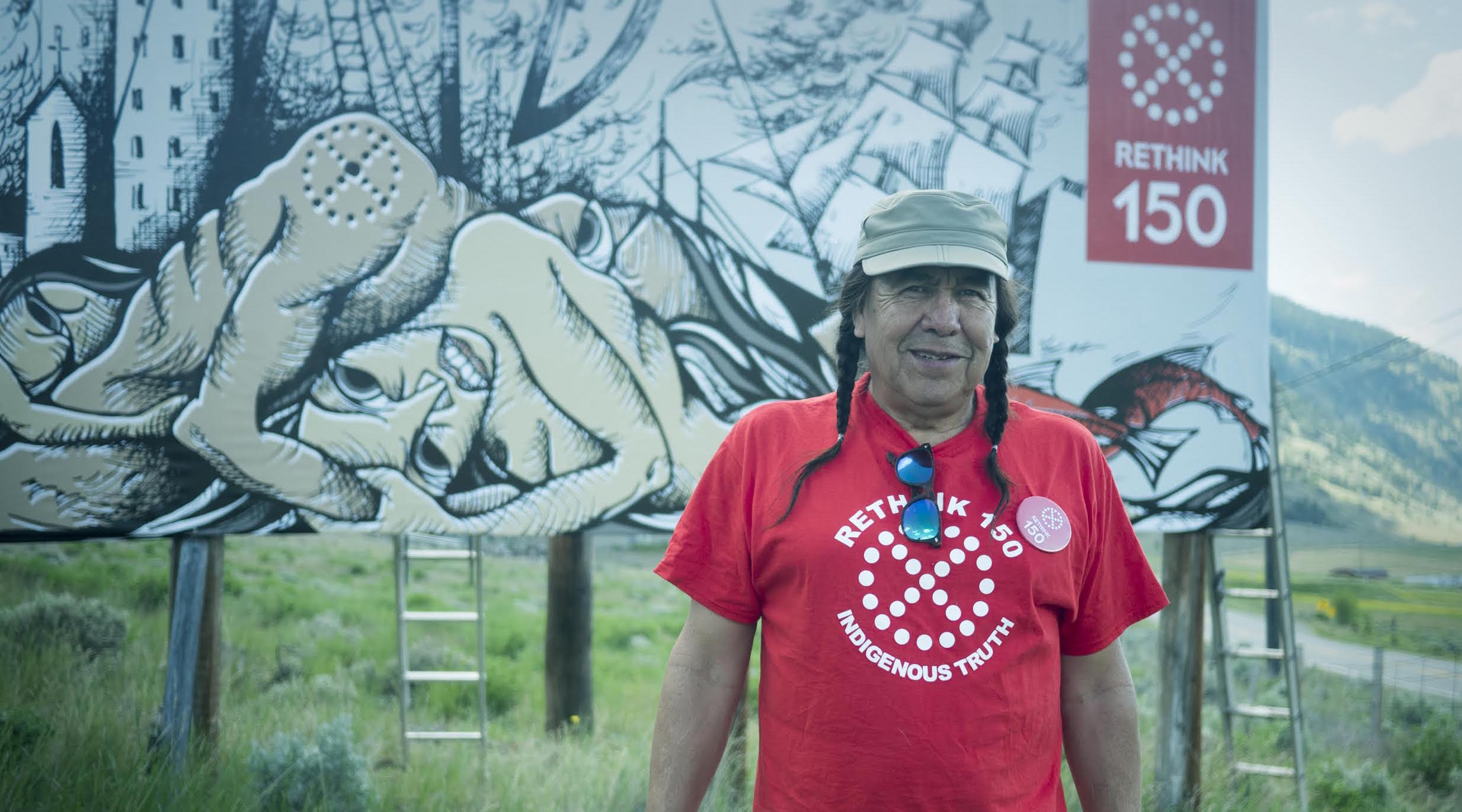 Dixon Terbasket at the first billboard raising on IR #2 (Lower Similkameen Indian Band) Photo credit: Zeus Helios