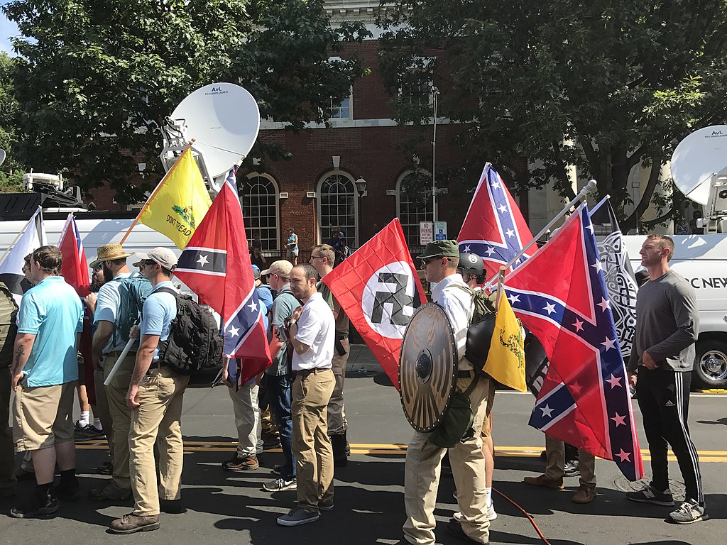 Even after a neo-Nazi rally in Charlottesville, white evangelical leaders continue to support Donald Trump.