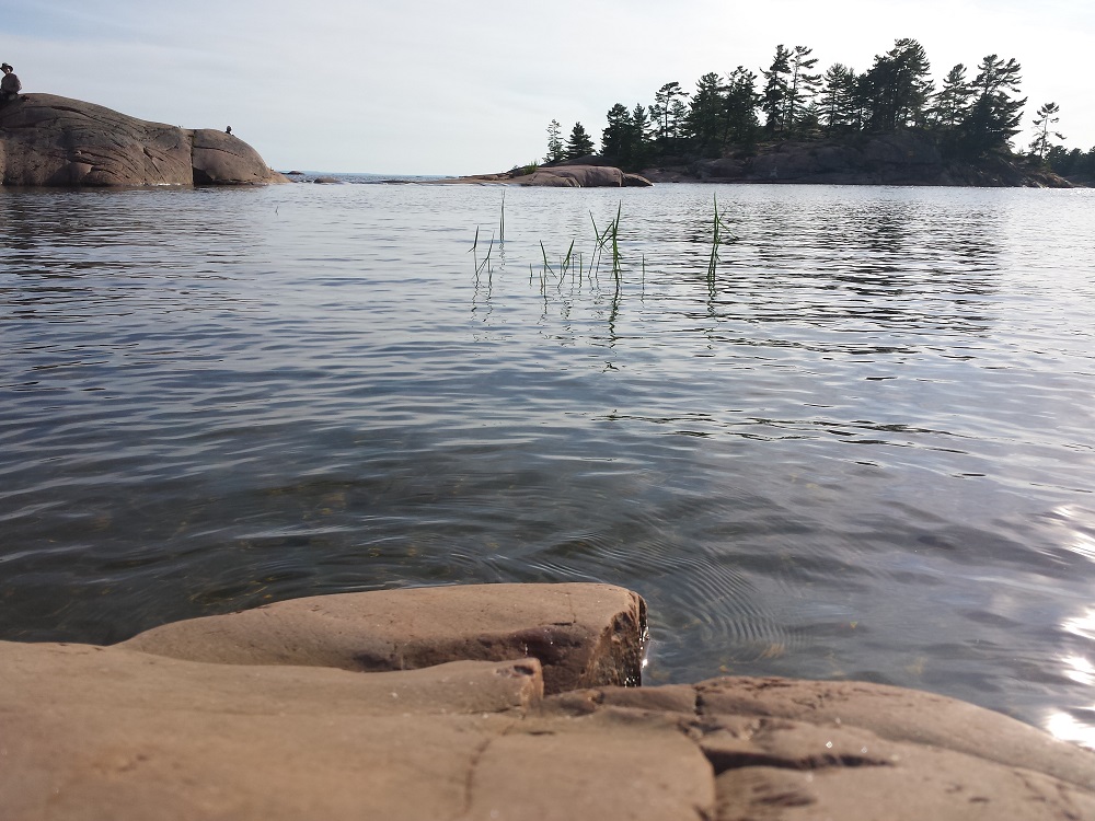 The shoreline of Georgian Bay near Killarney, ON, where the author's family is from.