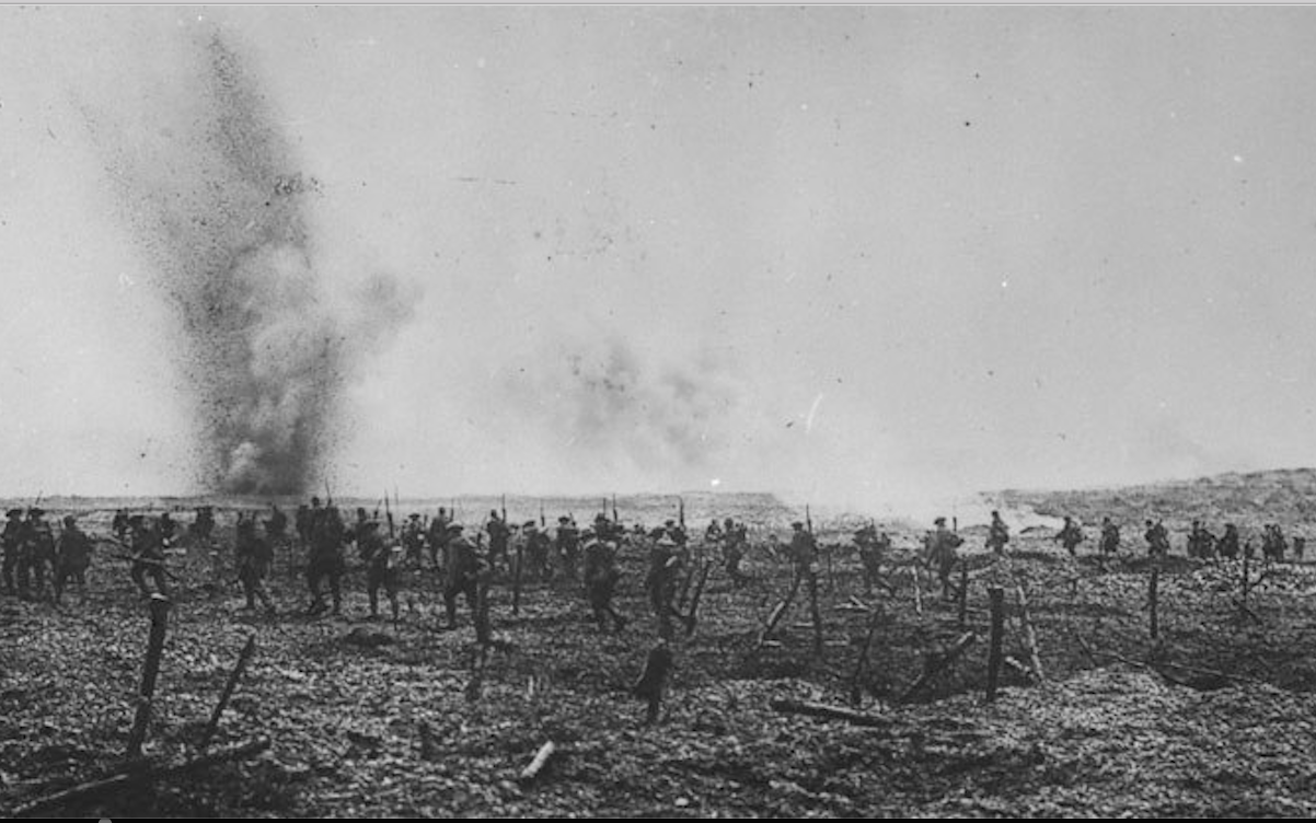 Canadians advancing through German wire entanglements, Vimy Ridge, April 1917. Canada. Department of National Defence. Library and Archives Canada, PA-001029