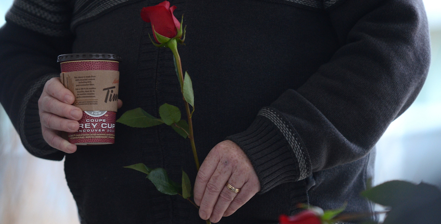 Attendee of candlelight vigil to honour victims of École Polytechnique massacre. Image: University of Fraser Valley/flickr