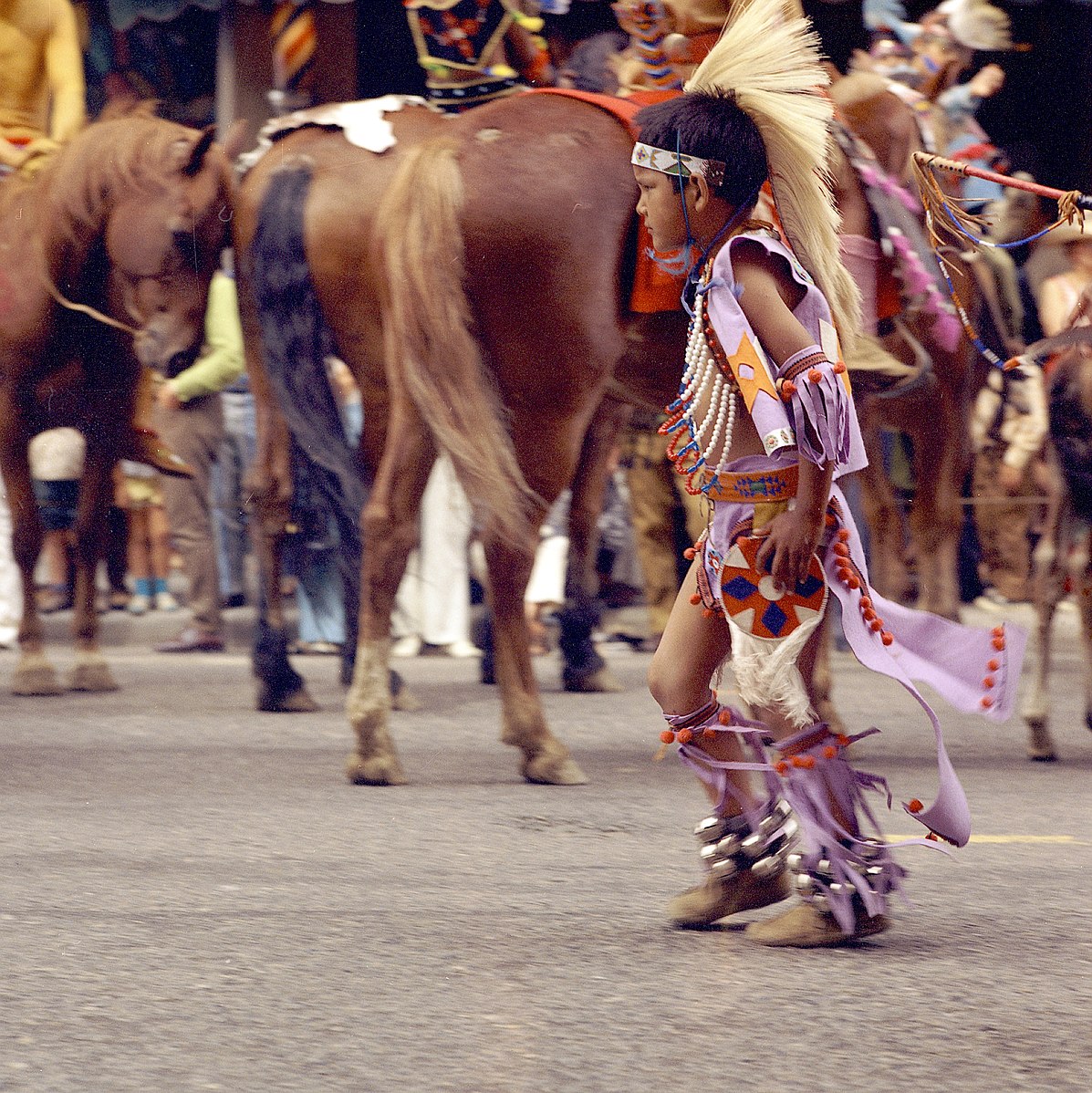 First_Nations_boy_in_the_Calgary_Stampede_Parade_(28324787705)