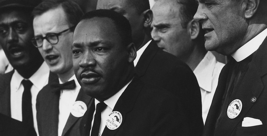 Martin Luther King Jr. and Mathew Ahmann in a crowd at March on Washington. Image: Rowland Scherman/Wikimedia Commons