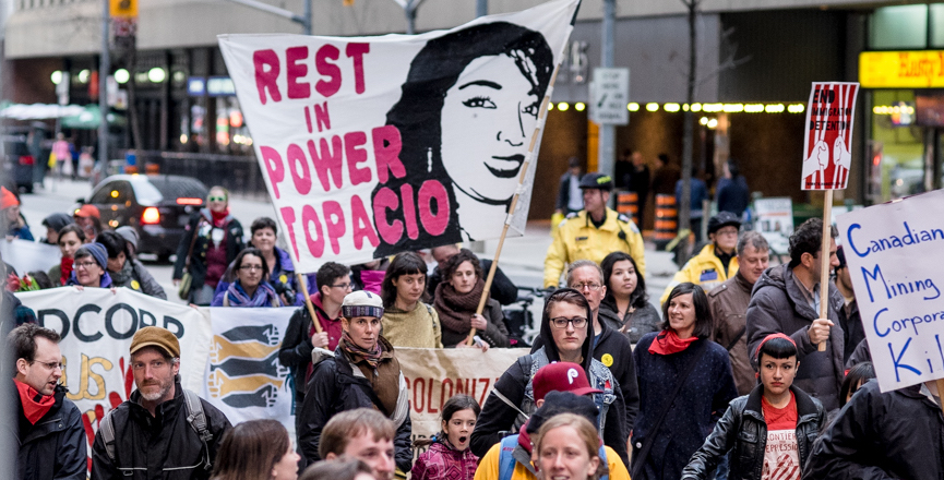 Photo caption: Activists in Toronto protest the murder of 16 year old anti-mining organizer Topacio Reynoso Pacheco. She led youth in her community in opposing Canadian company Tahoe Resource's silver mine in Guatemala. Image: Allan Lissner