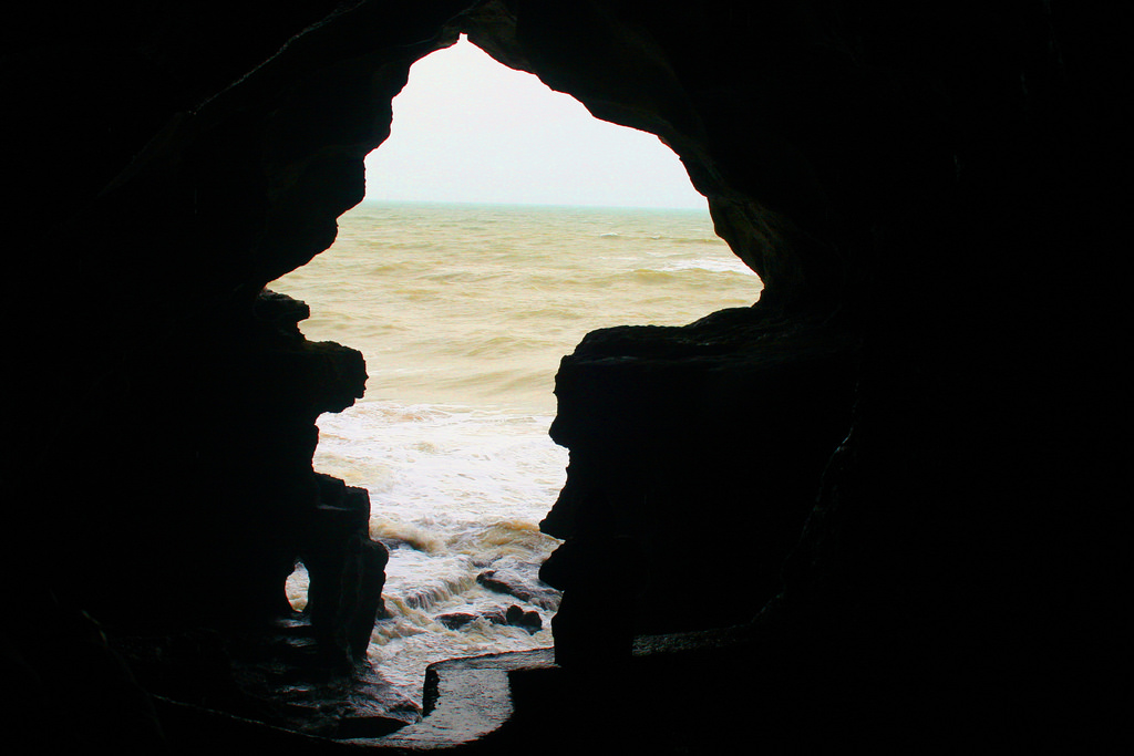 A cave mouth, roughly in the shape of Africa, on the continent's northern shore. Image: Kevin Walsh/Flickr