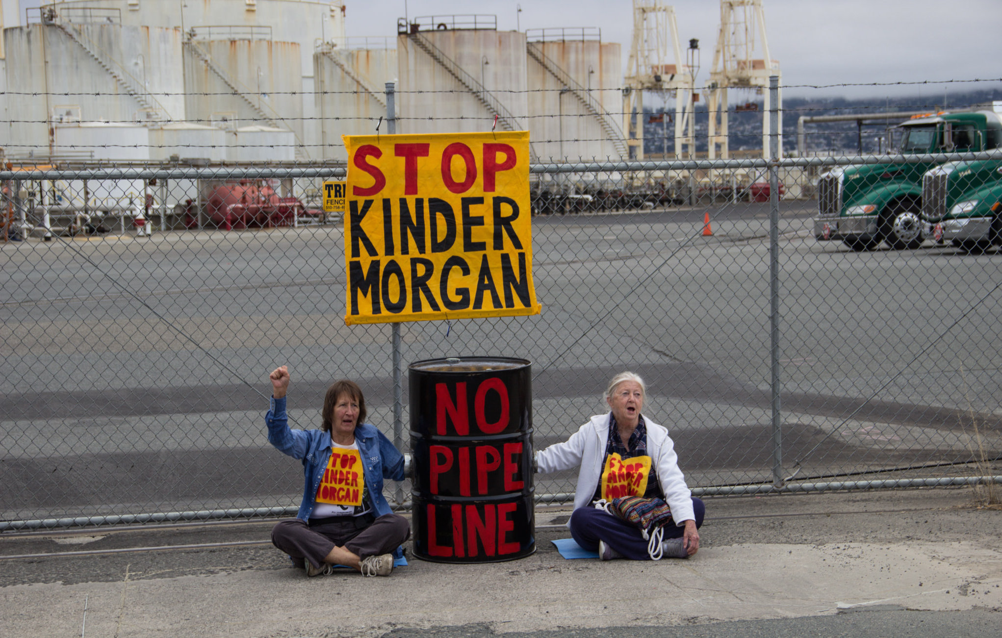 Protestors block the gates of the Kinder Morgan Richmond Terminal. Photo: Peg Hunter/flickr