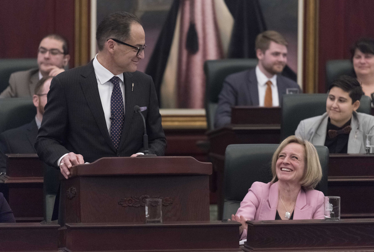 With Premier Rachel Notley looking on, Finance Minister Joe Ceci delivers his budget speech in the Alberta Legislature on March 22, 2018. Photo: Premier of Alberta/flickr