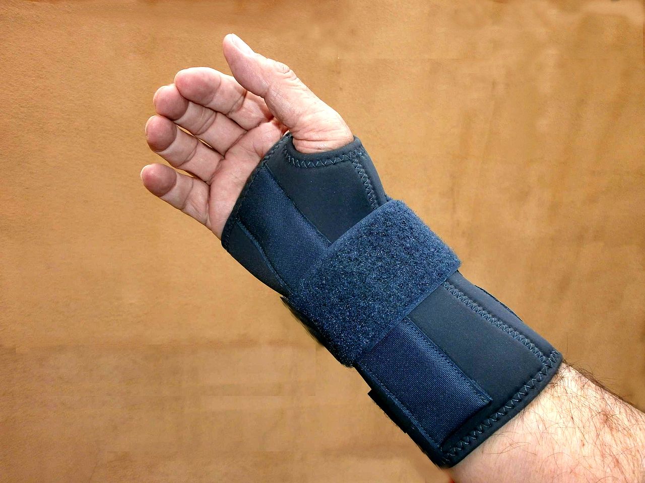 Wrist wrapped in a wrist brace