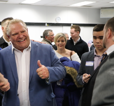 Doug Ford shakes hands with members of the public. Photo: Robert Bell/Flickr